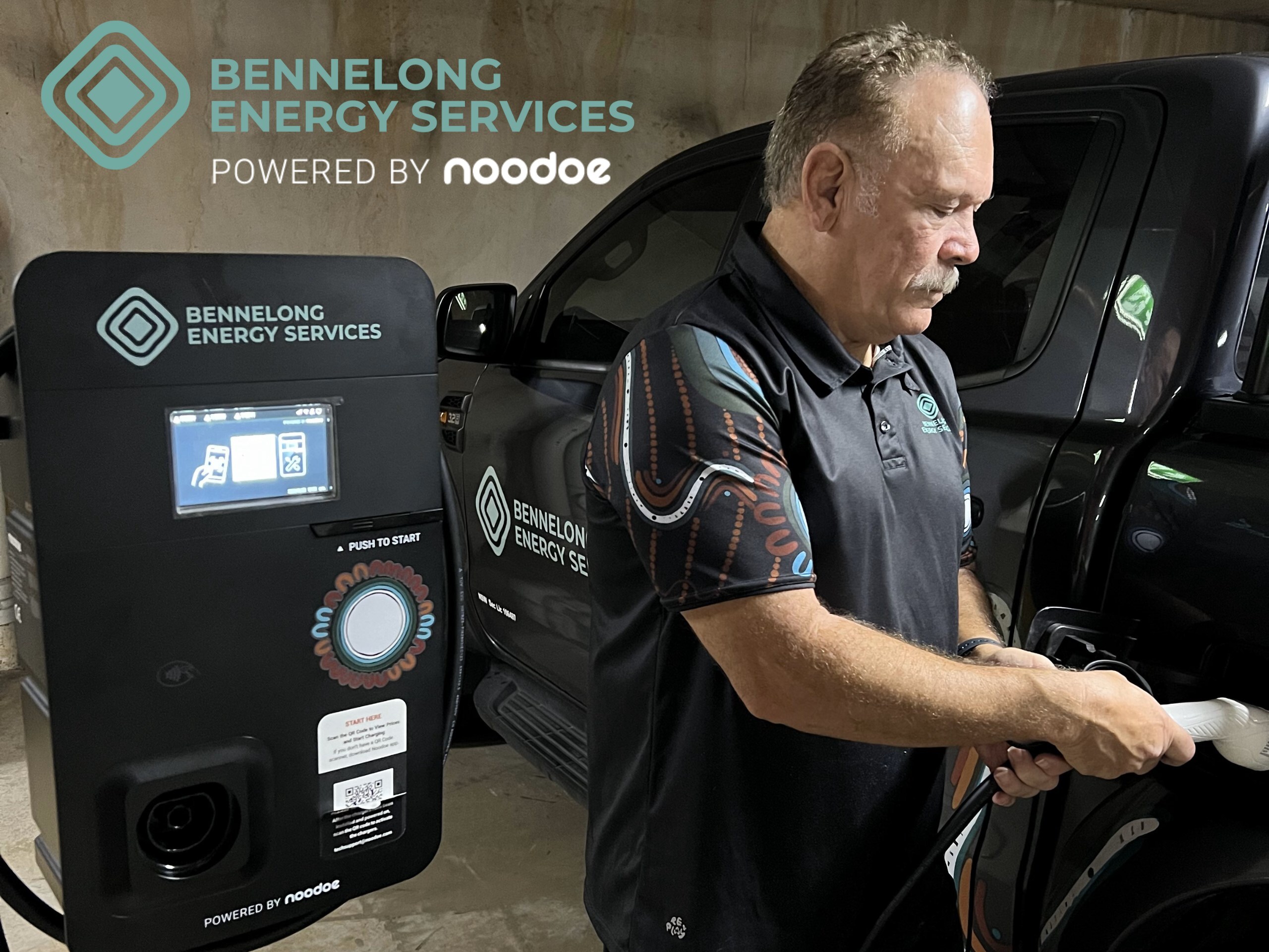 Owner and director of Bennelong Energy Services, Cliff Lyons, using A new Bennelong Energy Services EV charger Powered by Noodoe. Photo: Bennelong Energy Services Owner and director of Bennelong Energy Services, Cliff Lyons, using A new Bennelong Energy Services EV charger Powered by Noodoe. Photo: Bennelong Energy Services
