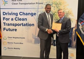 New York Lt. Governor Antonio Delgado (left) congratulates Volvo Group vice president Keith Brandis on the company receiving a $10 million award from NYSERDA