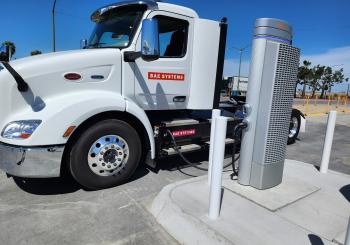 BAE Systems semi-truck recharging at the EV charging station