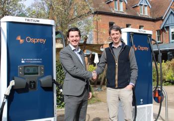 Osprey’s Stevewn Bates (left) and Nick Wells in front of the newly-installed rapid chargers at D’Parys Hotel, Bedford